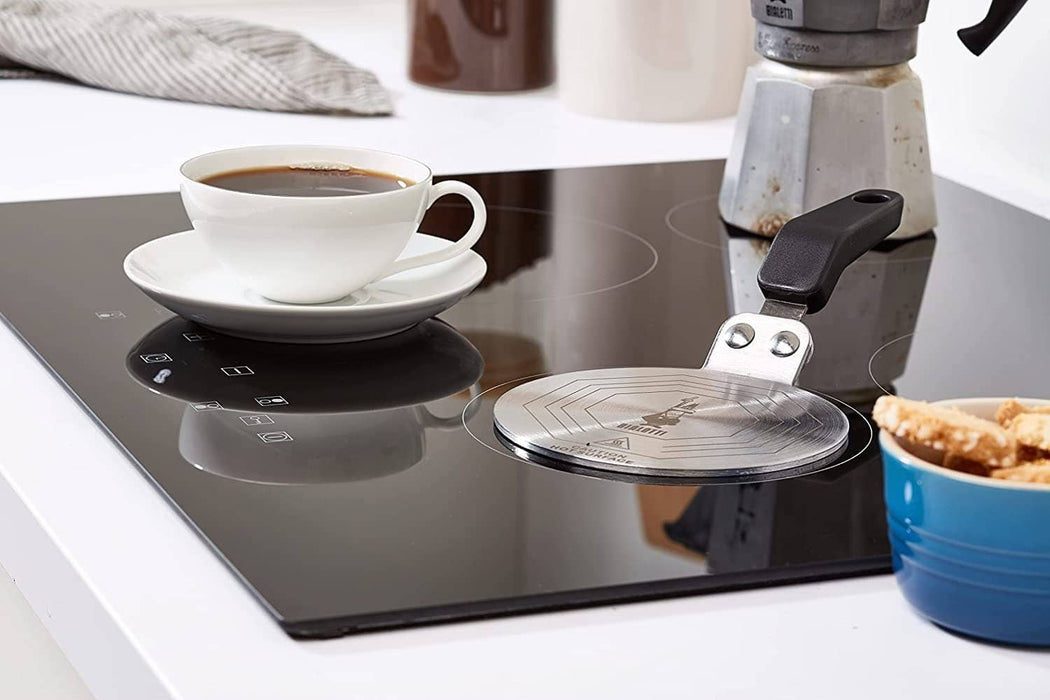 https://anthonysespresso.com/cdn/shop/products/bialetti-moka-induction-saucer-adapter-for-small-cookware-and-coffee-maker-6-cups-diameter-13-cm-steelbialetti-372156_1050x700.jpg?v=1694531621
