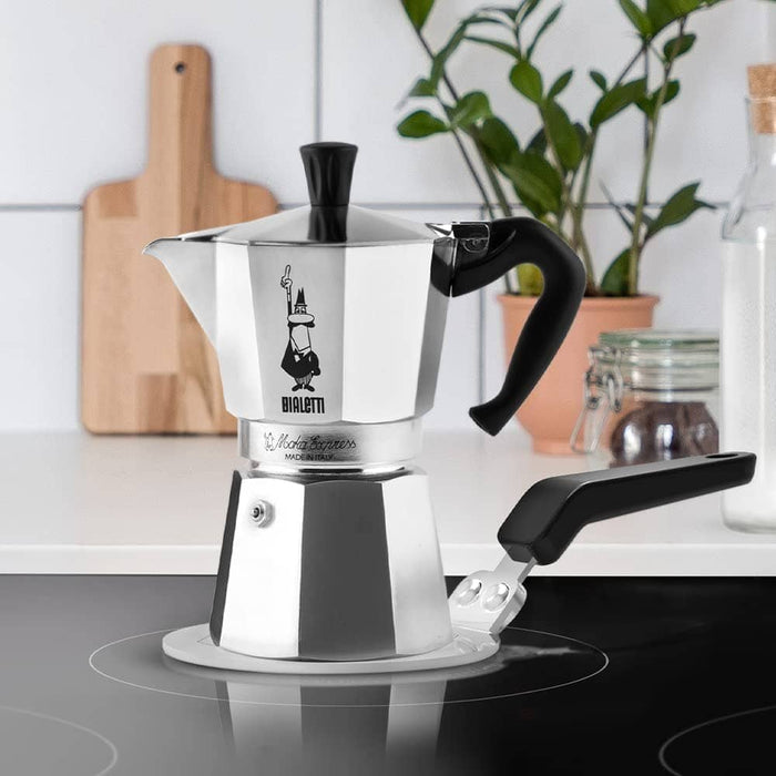 https://anthonysespresso.com/cdn/shop/products/bialetti-moka-induction-saucer-adapter-for-small-cookware-and-coffee-maker-6-cups-diameter-13-cm-steelbialetti-796956_700x700.jpg?v=1694531613